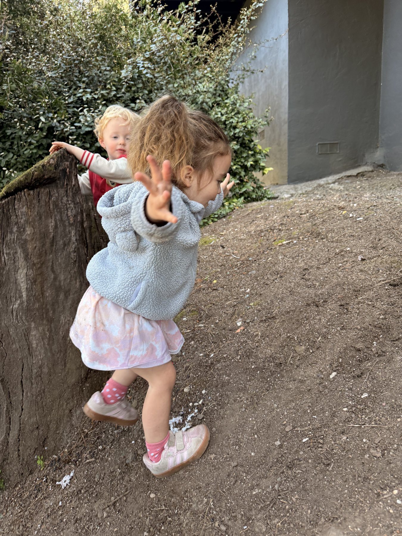 A child confidently exploring outdoors